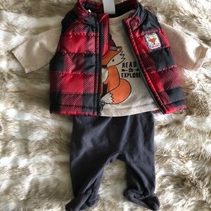 Newborn vest, long-sleeve shirt and footie pants.